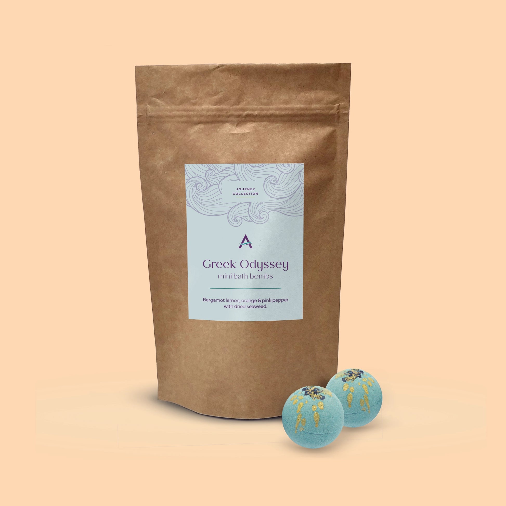 kraft pouch with label and two turquoise and gold mini bath bombs