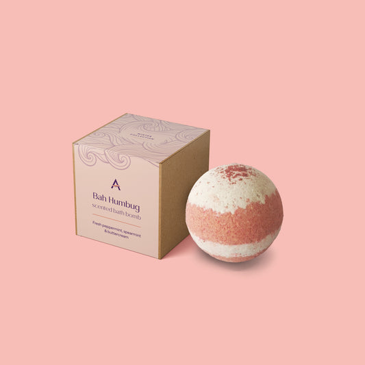 red and white striped bath bomb with box